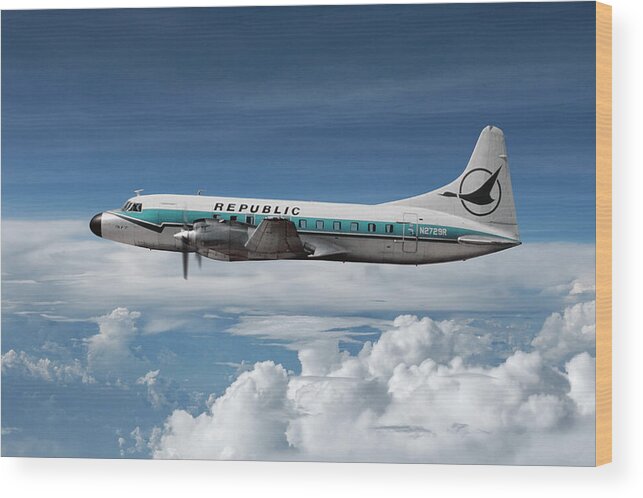 Republic Airlines Wood Print featuring the mixed media Republic Airlines Convair CV-580 Among the Clouds by Erik Simonsen