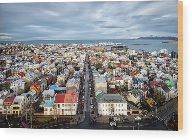 Hallgrimskirkja Wood Print featuring the photograph Reykjavik City 1 by Nigel R Bell