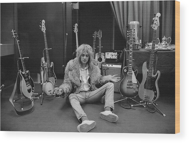 Sitting On Floor Wood Print featuring the photograph Roger Taylor by Michael Ochs Archives