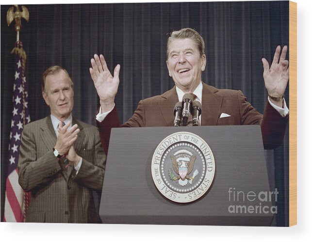 1980-1989 Wood Print featuring the photograph Ronald Reagan With George Bush by Bettmann