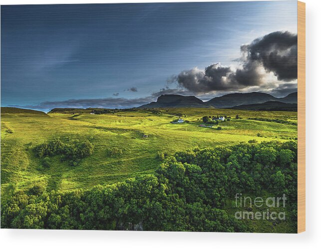 Background Wood Print featuring the photograph Rural Landscape With Remote Houses At The Old Man Storr Formation On The Isle Of Skye In Scotland by Andreas Berthold