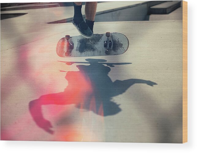 Cool Attitude Wood Print featuring the photograph Skateboarder Doing An Ollie by Devon Strong