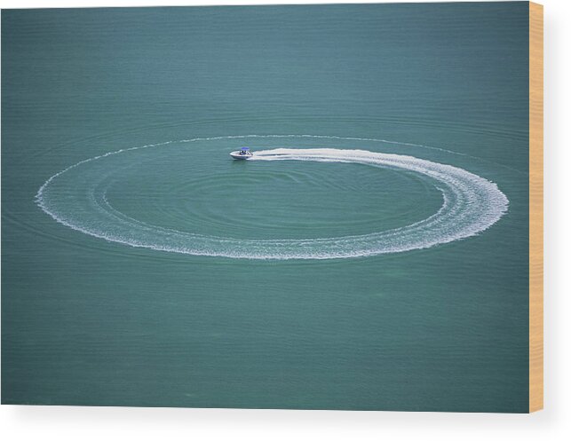 Recreational Pursuit Wood Print featuring the photograph Speedboat With Circular Wake by William R. Sallaz
