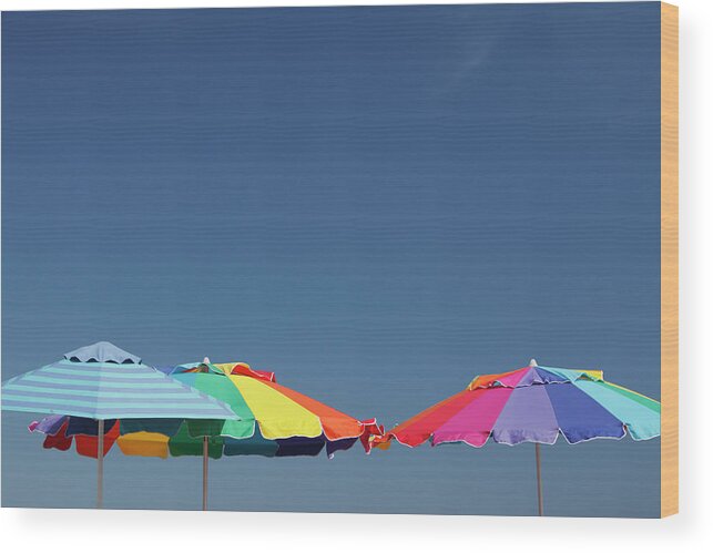 Clear Sky Wood Print featuring the photograph Sun Umbrellas by Carlos Davila