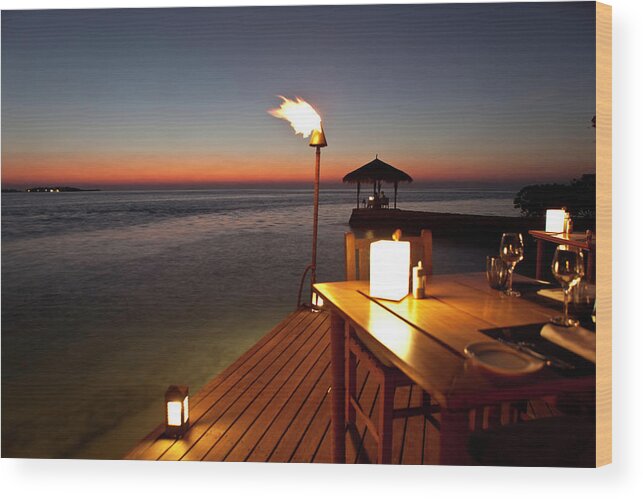 Water's Edge Wood Print featuring the photograph Sunset On Maldives by Thomasfluegge