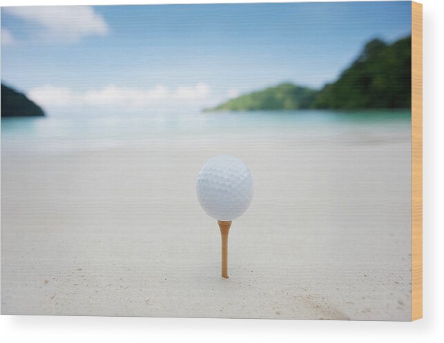 Ball Wood Print featuring the photograph Teeing Off On The Beach by Woraput