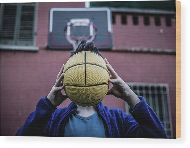 Handsome Wood Print featuring the photograph Teenager Holding Ball by Vivida Photo PC
