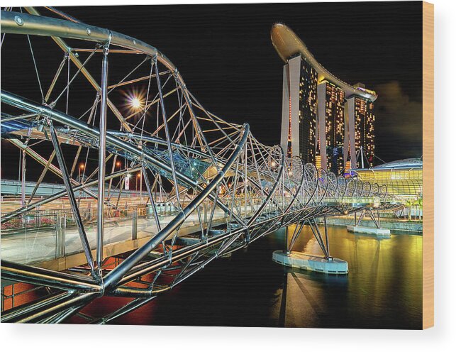 Built Structure Wood Print featuring the photograph The Helix Bridge And Marina Bay Sand by Nazarudin Wijee