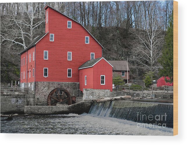 Red Mill Wood Print featuring the photograph The red mill historical landmark. by Sam Rino