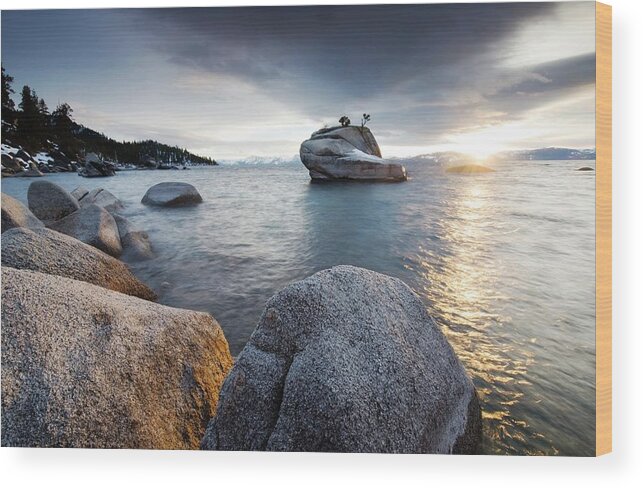 Tranquility Wood Print featuring the photograph The Sunset Reflects Off Of Lake Tahoe by Rachid Dahnoun