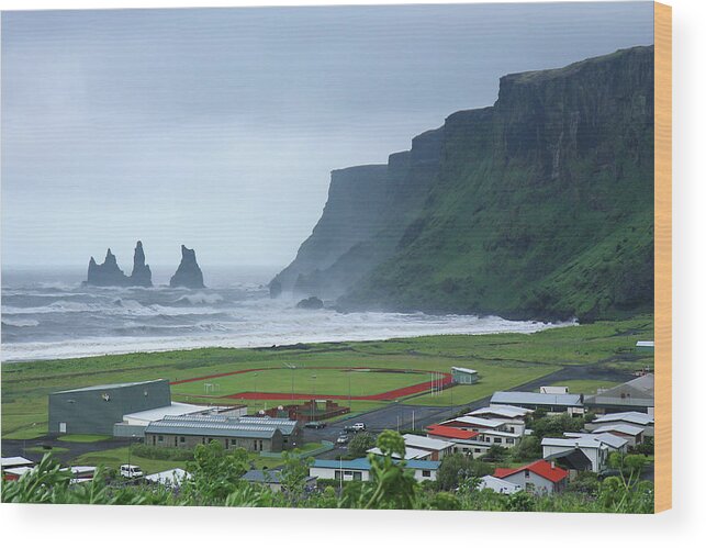 Tranquility Wood Print featuring the photograph The Town Of Vík, Iceland by Andrea Schaffer