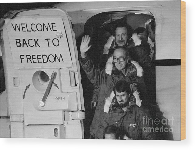 1980-1989 Wood Print featuring the photograph Three Hostages Freed From Iran by Bettmann