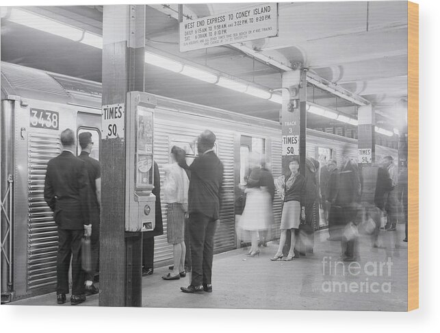 Mid Adult Women Wood Print featuring the photograph Times Square Subway Station by Bettmann