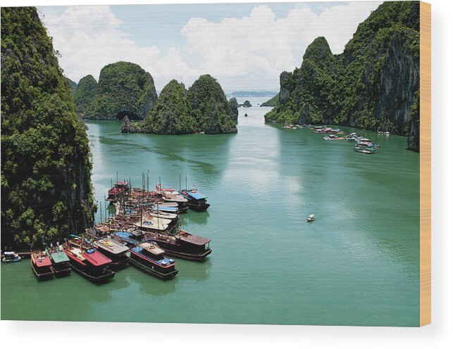 Seascapes Wood Print featuring the photograph Tourist boats, Halong Bay, Vietnam by Michalakis Ppalis