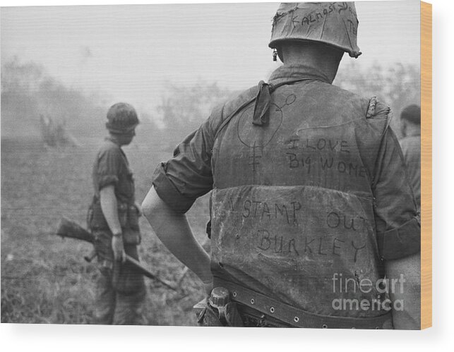 Vietnam War Wood Print featuring the photograph Us Marine With Slogans On Jacket by Bettmann
