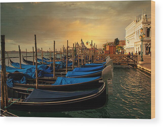 Venetian Gondolas Wood Print featuring the photograph Venetian Gondolas In The Sunset by Anette Ohlendorf