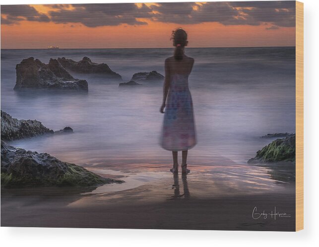 Carefree Woman Walking At Beach Against Sky During Sunset