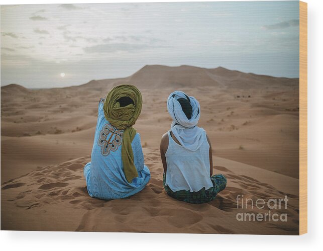 Young Men Wood Print featuring the photograph Woman Sitting In The Desert With Berber by Westend61