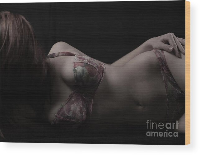 Torso Wood Print featuring the photograph Young Woman Lying In Front Of Black by Westend61