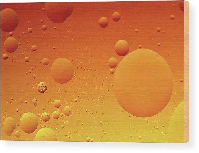Connection Wood Print featuring the photograph Bright abstract, yellow background with flying bubbles by Michalakis Ppalis