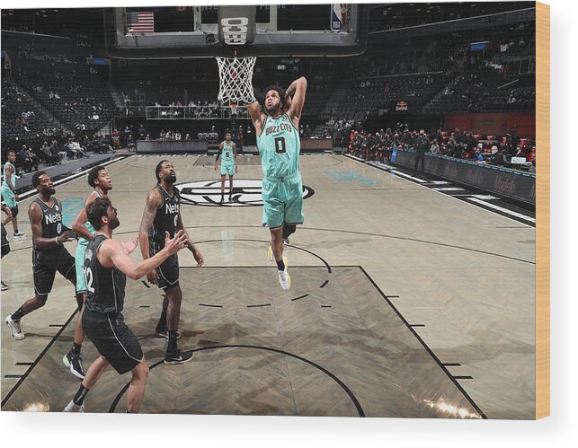 Miles Bridges Wood Print featuring the photograph Charlotte Hornets v Brooklyn Nets by Nathaniel S. Butler