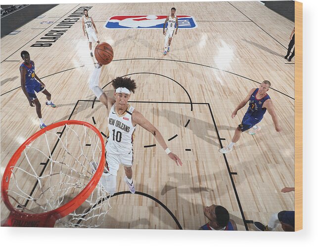 Nba Pro Basketball Wood Print featuring the photograph Denver Nuggets v New Orleans Pelicans by Joe Murphy