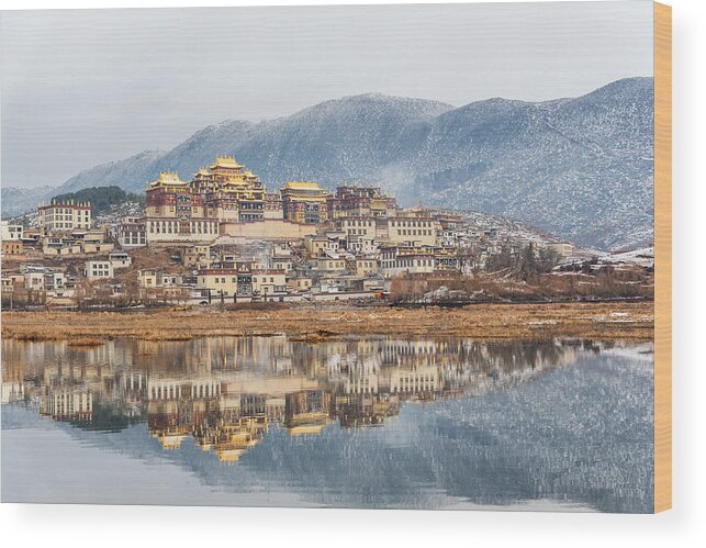 Chinese Culture Wood Print featuring the photograph Songzanlin Temple also known as the Ganden Sumtseling Monastery, is a Tibetan Buddhist monastery in Zhongdian city( Shangri-La), Yunnan province China and is closely Potala Palace in Lhasa #1 by Suttipong Sutiratanachai
