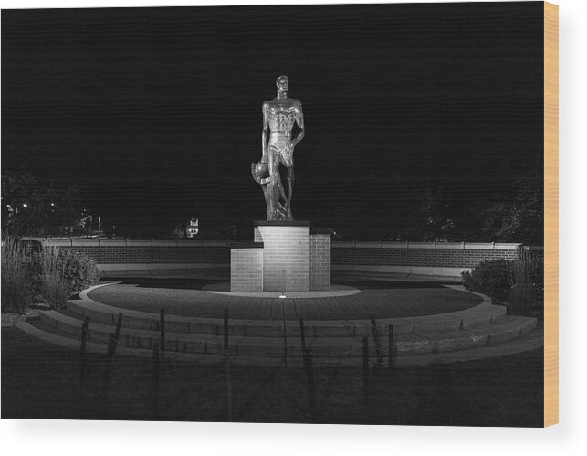 Spartan Staue Night Wood Print featuring the photograph Spartan statue at night on the campus of Michigan State University in East Lansing Michigan #1 by Eldon McGraw