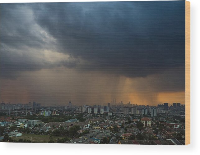 Shielding Wood Print featuring the photograph Stormy and rainy sunset in downtown Kuala Lumpur #1 by Shaifulzamri