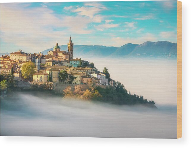 Trevi Wood Print featuring the photograph Trevi picturesque village in a foggy morning. Perugia, Umbria, I by Stefano Orazzini