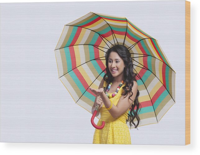 People Wood Print featuring the photograph Woman with umbrella feeling for rain #1 by Sudipta Halder