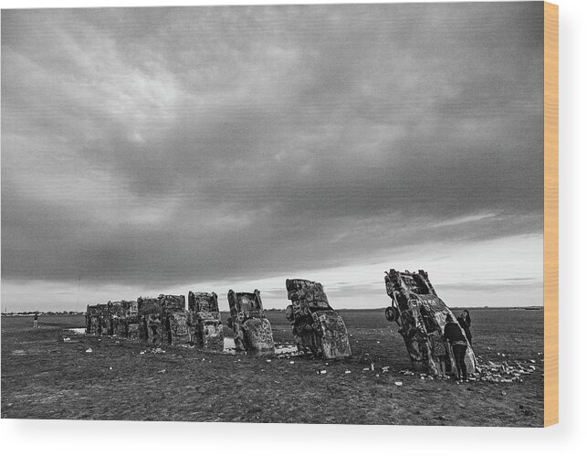 Cars Buried Wood Print featuring the photograph Cadillac Ranch on Historic Route 66 in Amarillo Texas in black and white #10 by Eldon McGraw