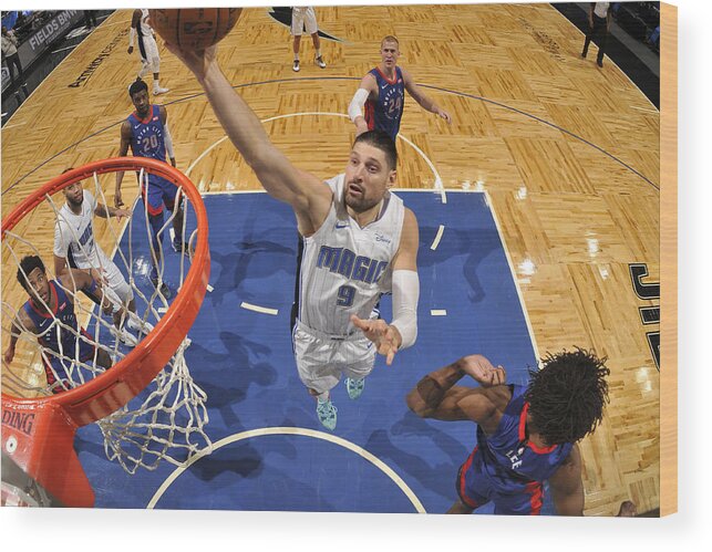 Nba Pro Basketball Wood Print featuring the photograph Detroit Pistons v Orlando Magic by Fernando Medina