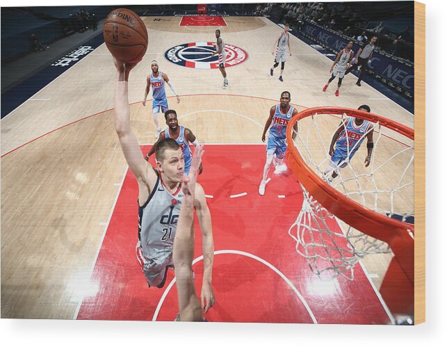 Moritz Wagner Wood Print featuring the photograph Brooklyn Nets v Washington Wizards by Ned Dishman