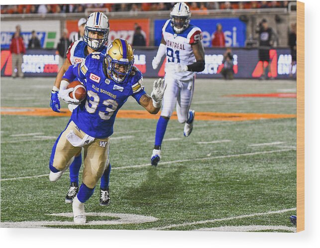 Sports Ball Wood Print featuring the photograph CFL: AUG 24 Winnipeg Blue Bombers at Montreal Alouettes #5 by Icon Sportswire