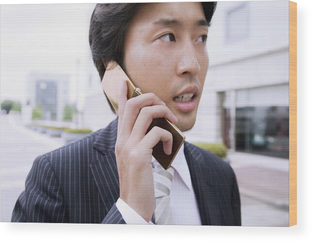 Corporate Business Wood Print featuring the photograph A Business Man Talking On Cell Phone by Kohei Hara