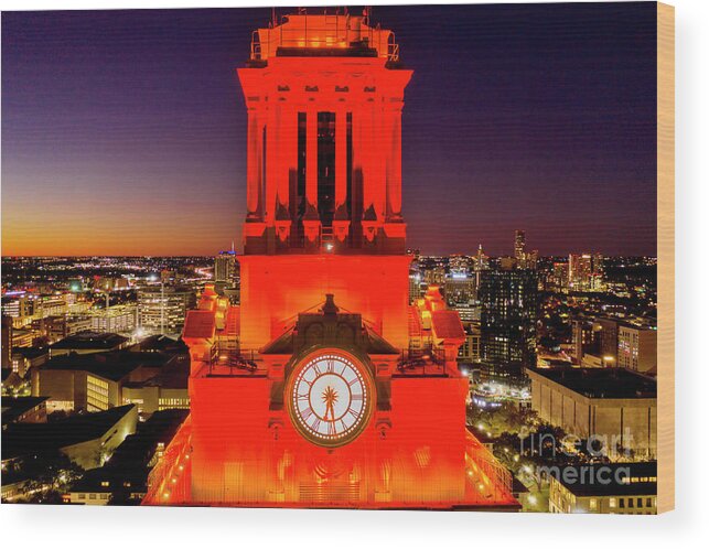 Texas Tower Wood Print featuring the photograph A closeup view of the iconic UT Clock Tower shining bright over the University of Texas Campus by Dan Herron