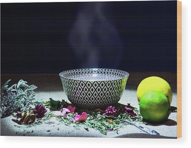 Tea Wood Print featuring the photograph A drinking bowl with tea and herbs. by Bernhard Schaffer