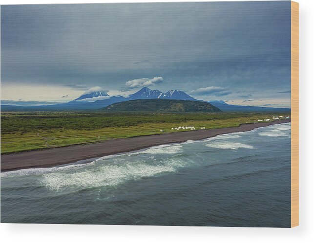 Beach Wood Print featuring the photograph Beach with black sand and volcano by Mikhail Kokhanchikov