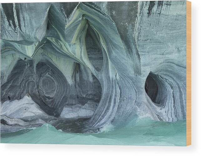 Built Structure Wood Print featuring the photograph Bizarre rock formations of the marble caves, Cuevas de Marmol, Lago General Carrera, Puerto Rio Tranquilo, Region de Aysen, Chile by Peter Giovannini