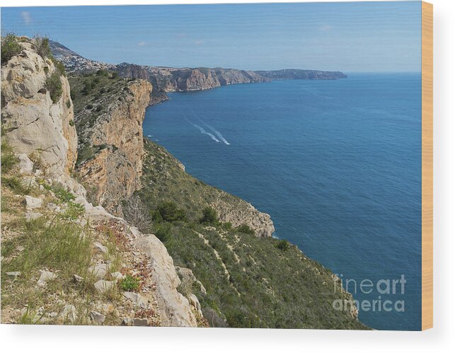 Mediterranean Sea Wood Print featuring the photograph Blue Mediterranean Sea and limestone cliffs by Adriana Mueller