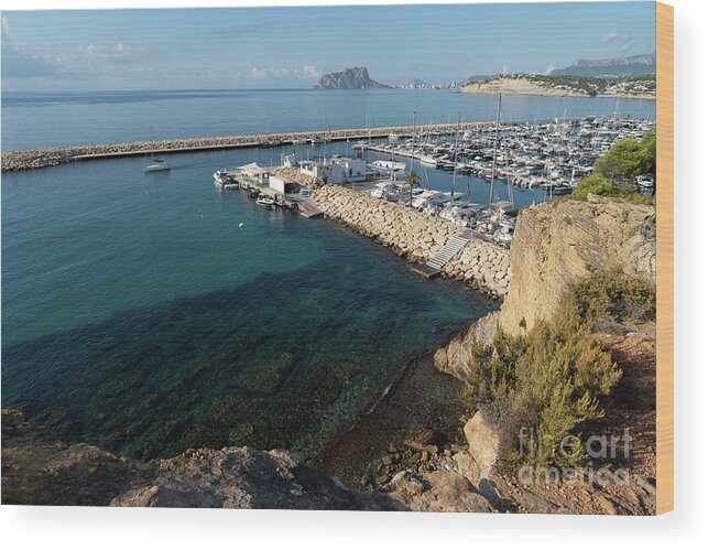 Mediterranean Coast Wood Print featuring the photograph Blue Mediterranean Sea and marina in Moraira 2 by Adriana Mueller