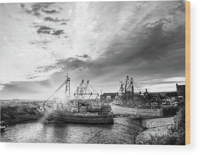 Norfolk Wood Print featuring the photograph Brancaster Norfolk fishing trawlers at sunrise BW by Simon Bratt