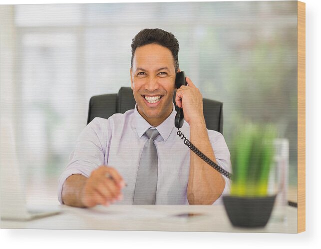 Corporate Business Wood Print featuring the photograph Business Executive Talking On Landline by Michaeljung