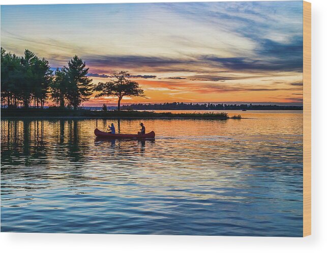 Higgins Lake Wood Print featuring the photograph Canoe at Sunset by Joe Holley