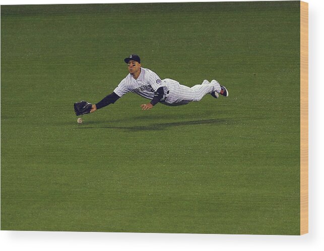 Carlos Gonzalez - Us Baseball Player Wood Print featuring the photograph Carlos Gonzalez and Adrian Gonzalez by Justin Edmonds