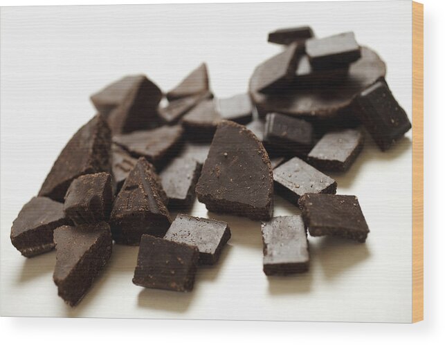 White Background Wood Print featuring the photograph Chocolate pieces, close-up by Jack Hollingsworth