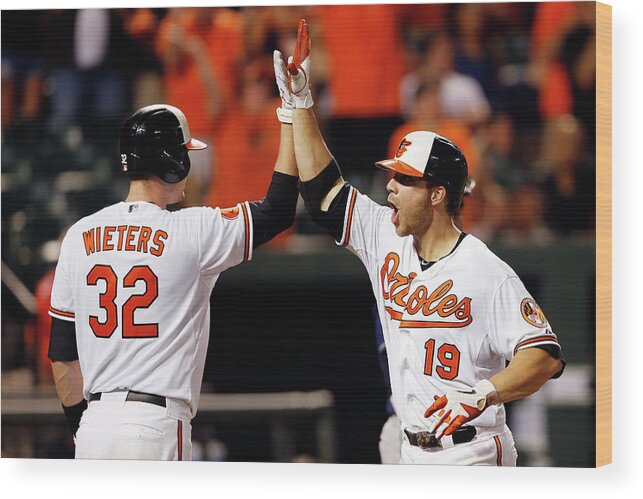 American League Baseball Wood Print featuring the photograph Chris Davis and Matt Wieters by Rob Carr