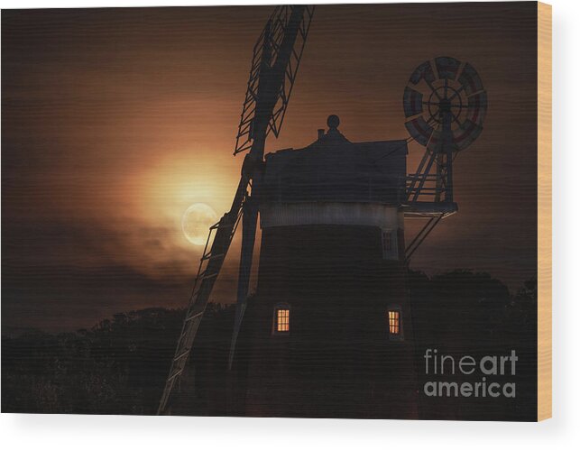 Cley Wood Print featuring the photograph Cley windmill and harvest moon at night in Norfolk by Simon Bratt