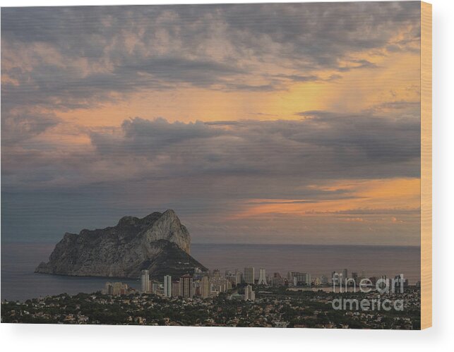 Sunset Wood Print featuring the photograph Clouds on the Mediterranean coast in Calpe by Adriana Mueller
